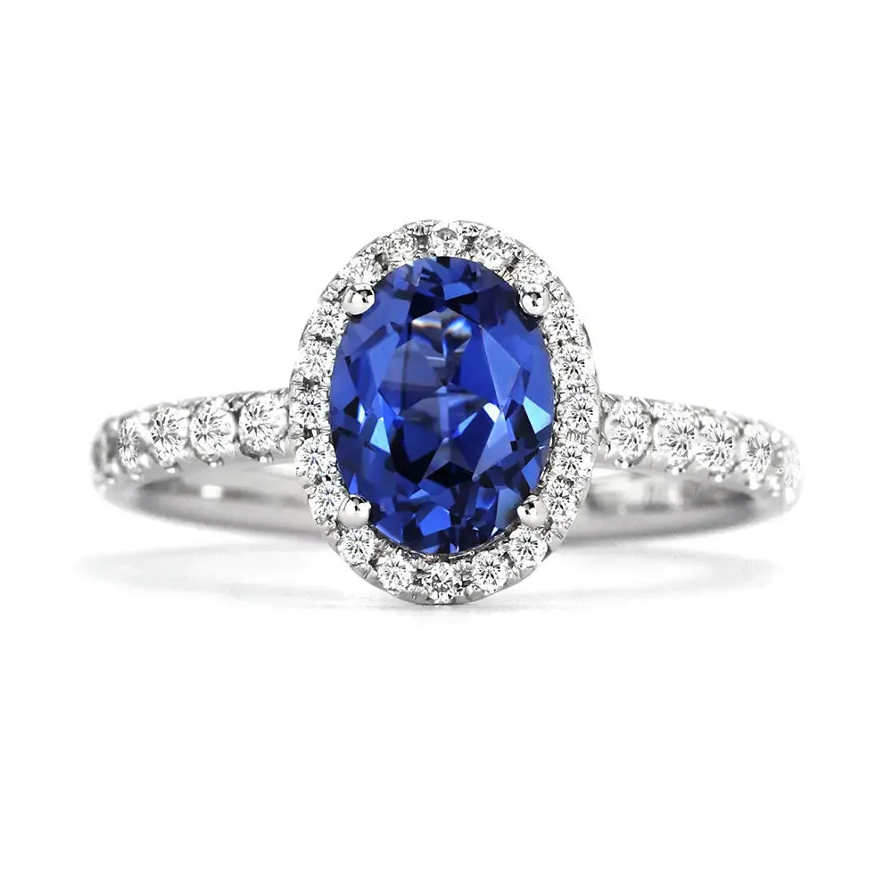 Ready Made | 1.6 Carat Royal Blue Oval Lab Grown Sapphire with Halo Ring in 18K White Gold